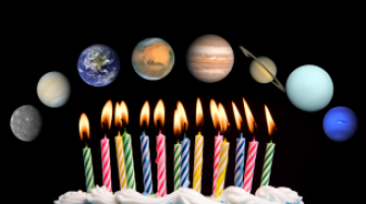 A birthday cake with lots of calndles which are alight. Above them are images of each planet in our Solar System